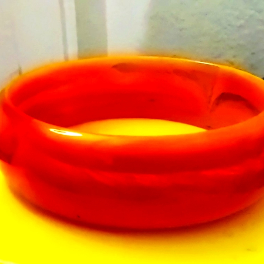 Vintage bakelite orange swirl bracelet